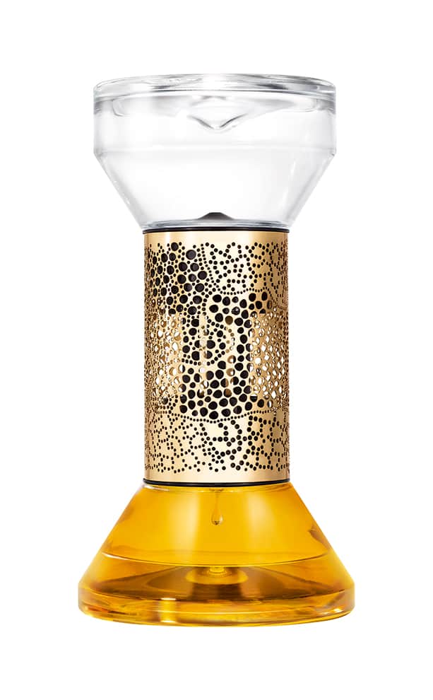 Diffuseur Le Sablier composé de 2 flacons de verre contenant la fragrance. À chaque senteur une couleur, le jaune aux effluves de Gingembre. ©Diptyque Paris